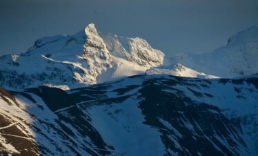 The Rush Lake Trek is one of the most rewarding high-altitude trekking adventures in Pakistan, taking you deep into the Karakoram Range of Hunza Valley. At an elevation of 4,700 meters, Rush Lake is recognized as the highest alpine lake in Pakistan and one of the most scenic viewpoints in the region. From its shores, trekkers are rewarded with breathtaking panoramas of Spantik (Golden Peak), Ultar Sar, Malubiting, Passu Cones, Batura Massif, and on exceptionally clear days, even K2 in the far distance. Unlike crowded trekking routes, the Rush Lake Trek offers a perfect balance of adventure, solitude, and cultural experience. The journey passes through traditional villages, alpine pastures, glacier crossings, and remote campsites used by shepherds for centuries. Each day reveals changing landscapes, from green meadows and crystal-clear streams to dramatic glaciers and towering snow-covered peaks. This trek is ideal for trekkers who want to experience trekking in Pakistan 2026 beyond mainstream routes. It is physically demanding but achievable for fit trekkers with some prior hiking experience. Carefully planned acclimatization, experienced local guides, and well-paced walking days make the Rush Lake Trek a safe and unforgettable expedition. At Trips Nomad Adventure, we focus on responsible trekking, local community support, and authentic exploration. The Rush Lake Trek is not just about reaching a destination; it is about walking through living landscapes, connecting with mountain cultures, and discovering the untouched beauty of the Karakoram.